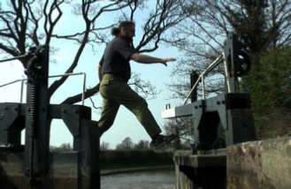 Ian leaping between the lock gates