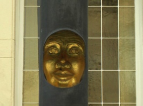 Pillars with hollow masks outside the Grand Duke's palace Pillars with hollow masks outside the Grand Duke's palace